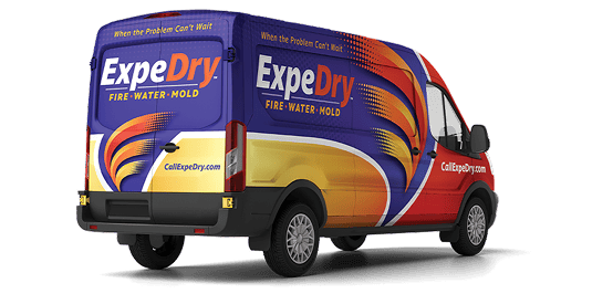 An ExpeDry Fire, Water, and Mold restoration service van.